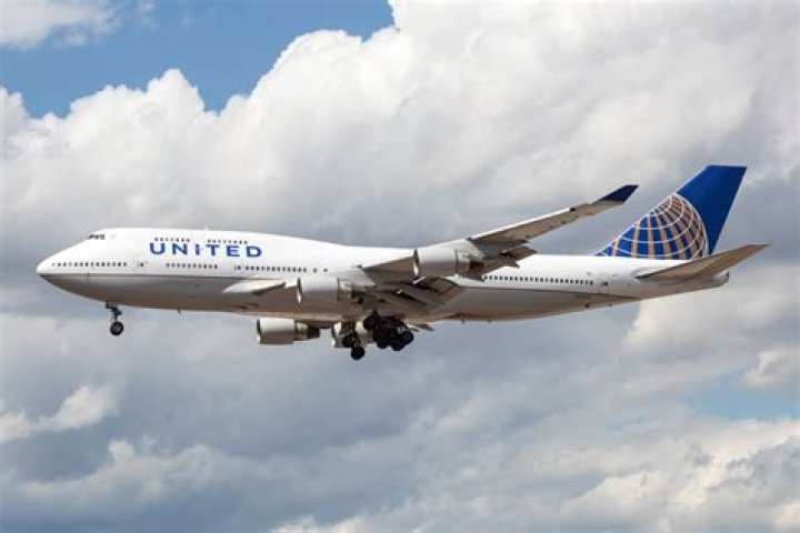 "Slurring" United Airlines Passenger Nearly Jumps From Emergency Exit